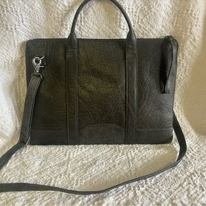 Leather laptop bag. Cotton interior. Never used.